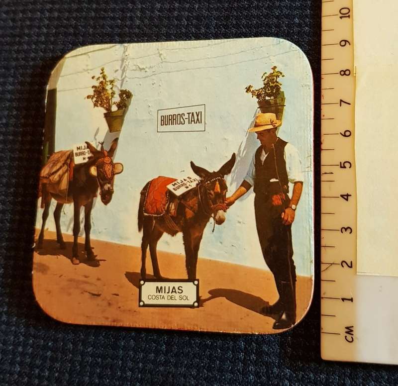 Vintage cork coasters, scenes of Mijas Costa del Sol in Spain.