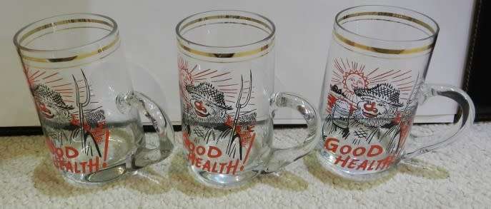 Vintage Beer Tankards. 3x glass with handle, gold rimmed, 1970s type with decal of farmer toasting