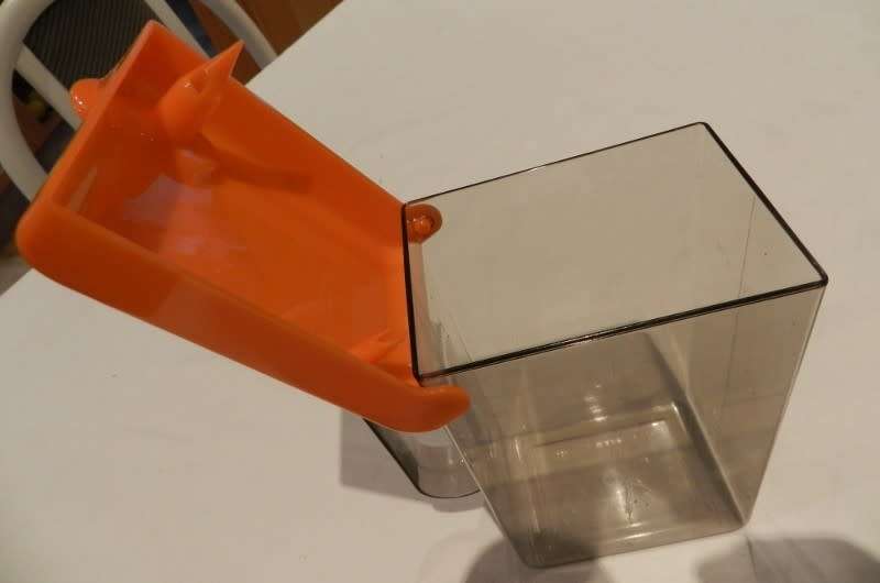 Vintage Plastic Milk or fruit juice carton container/pourer. Orange flip lid with spout and handle.
