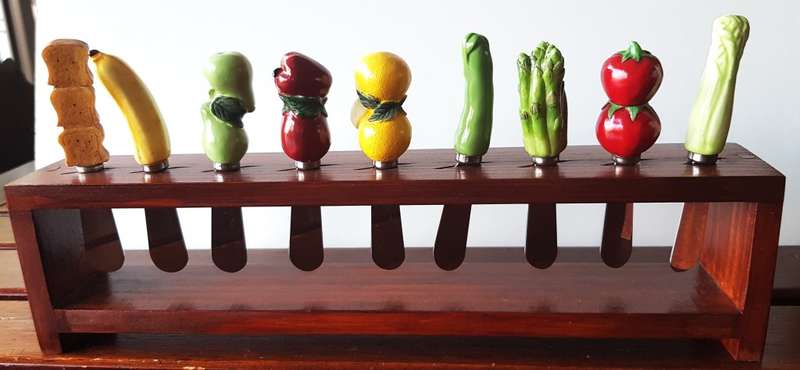 Collectable set of novelty hand painted resin and porcelain handled Cheese/butter spreader knives