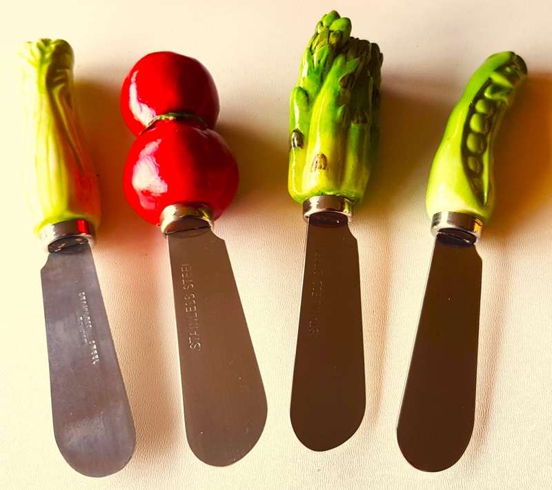 Collectable set of novelty hand painted resin and porcelain handled Cheese/butter spreader knives