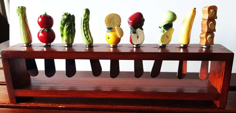 Collectable set of novelty hand painted resin and porcelain handled Cheese/butter spreader knives