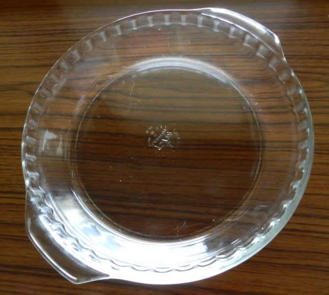 Anchor Hocking glass pie plate.  Made in USA ovenware.  A round pie dish with scalloped edges