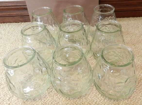 Collection of empty and cleaned citronella candle glass jars. Can be used with tea lights