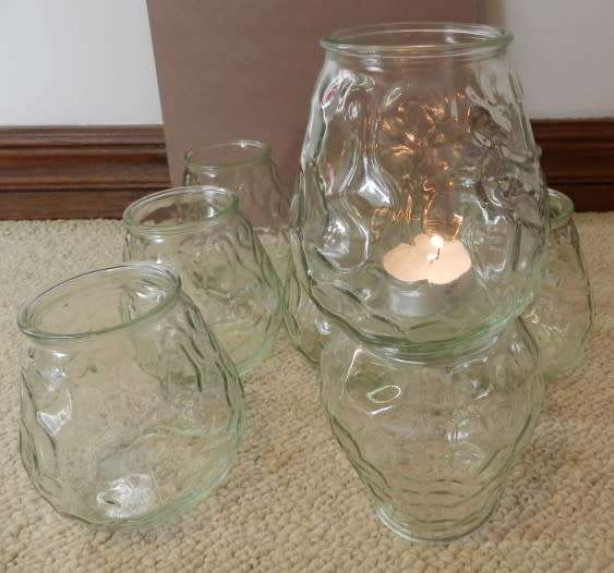 Collection of empty and cleaned citronella candle glass jars. Can be used with tea lights