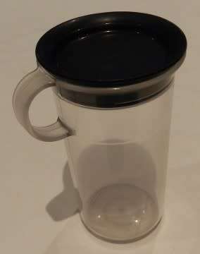 Vintage Tupperware server/saver mug/jug with handle and pourer lid.