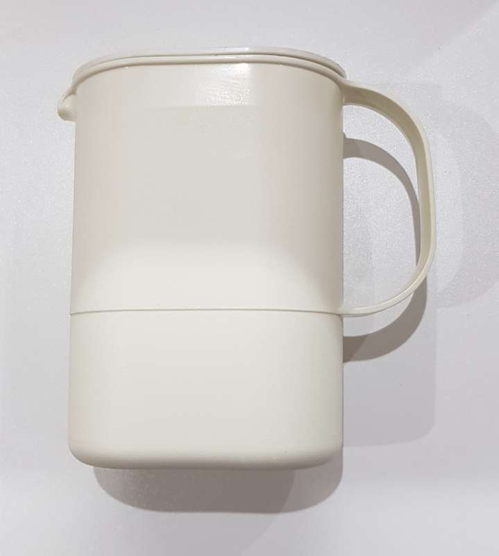 Vintage Tupperware.  1x Jug oval (colourless/see through) with secure cream coloured lid.