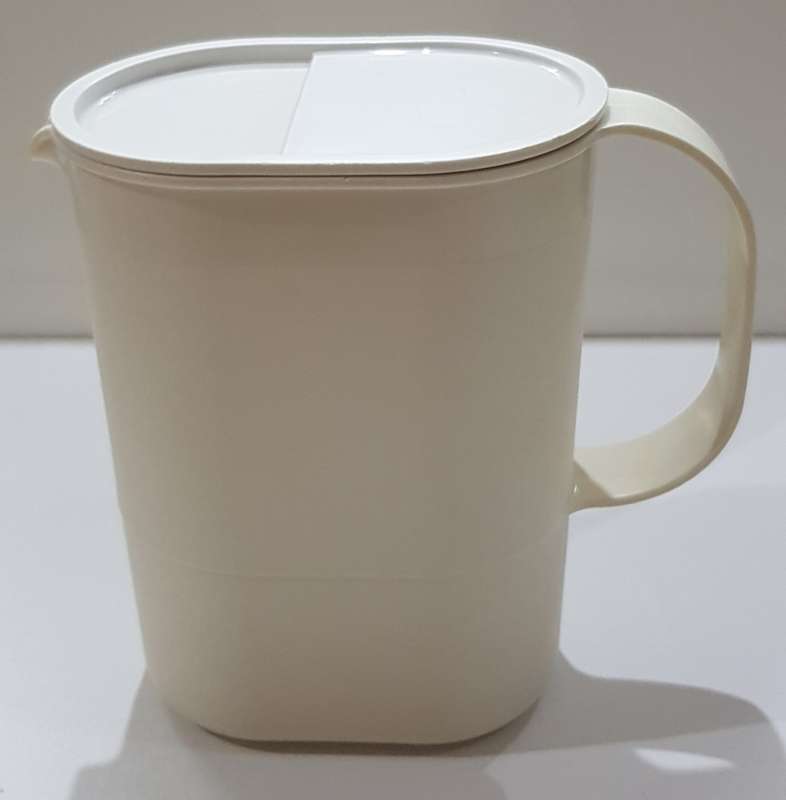 Vintage Tupperware.  1x Jug oval (colourless/see through) with secure cream coloured lid.