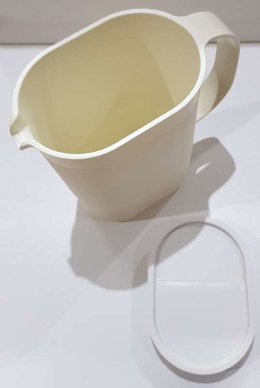 Vintage Tupperware.  1x Jug oval (colourless/see through) with secure cream coloured lid.