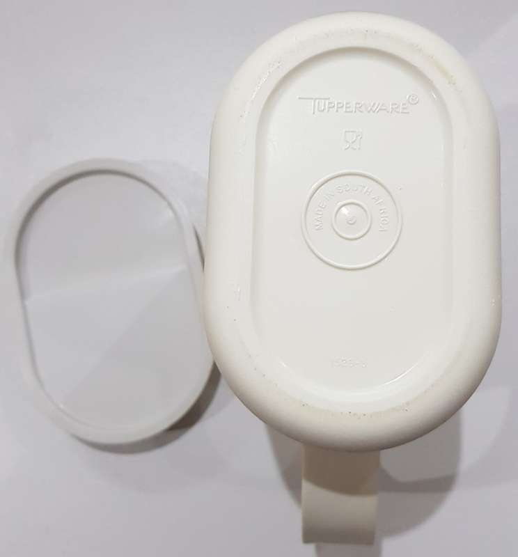 Vintage Tupperware.  1x Jug oval (colourless/see through) with secure cream coloured lid.