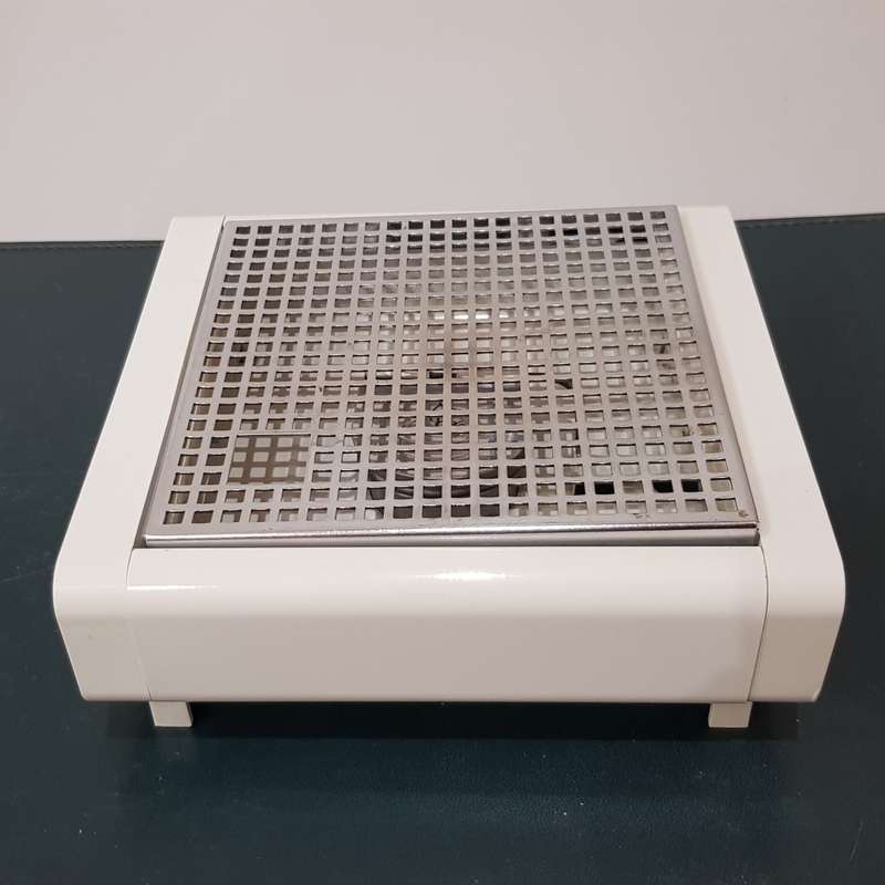 Vintage Brabantia Single Tealight Burner with snuffer and grid.  This is a food plate warmer