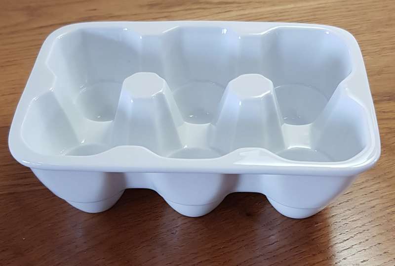 White Novelty porcelain egg holder. Takes 6x Jumbo size eggs.