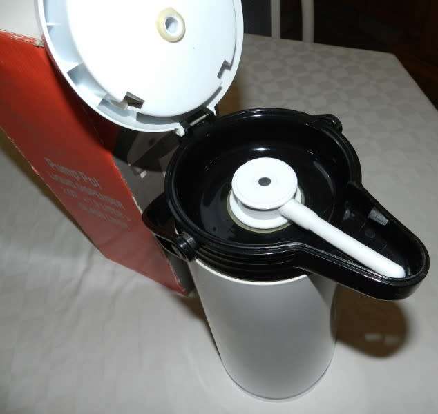 Pump Pot with vacuum insulated glass interior. Hot Coffee/cold water dispenser.