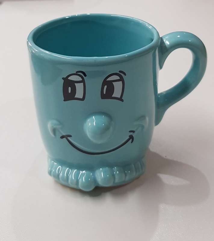 Novelty Ceramic Mug  Aqua blue mug with toes, nose and mouth