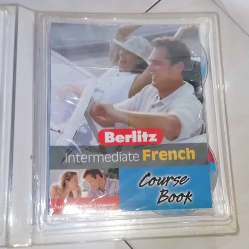 Intermediate French course book and DVDs