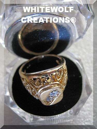 NOT TO BE MISSED  ELECTRO PLATED GOLDEN RING WITH 2 DIAMANTE SIZE 18