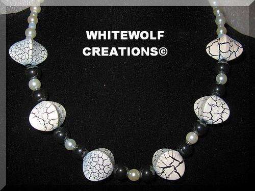 40 CM HEMATITE NECKLACE WITH 2.5 WHITE BEADS
