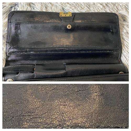 A Vintage Leather Wristlet by Woolworths
