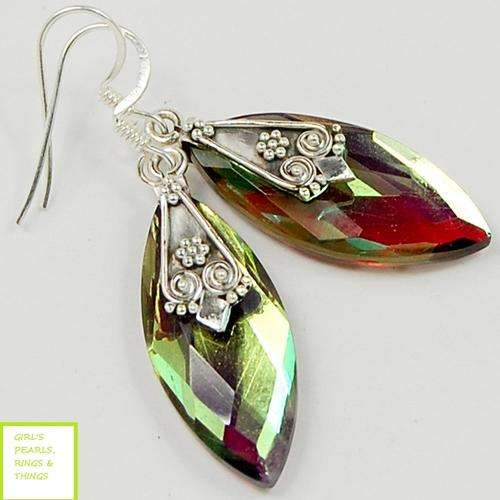 "SALE.... SALE" GENUINE MAGIC TOPAZ EARRINGS CRAFTED IN SOLID .925 STERLING SILVER