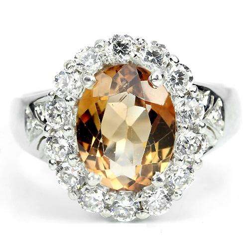 "SANTA'S GOT A SURPRISE!" GENUINE CHAMPANGE TOPAZ RING IN .925 STERLING SILVER