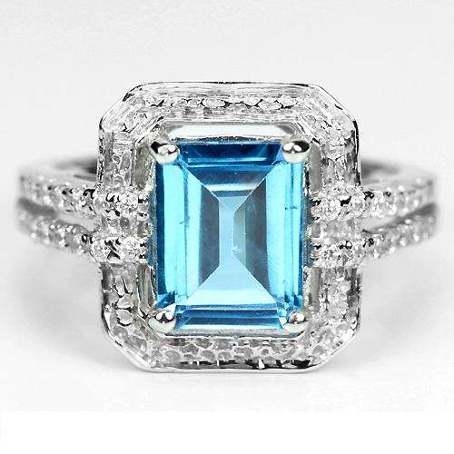 "REDUCED BY R200!" GENUINE BLUE TOPAZ RING IN STERLING SILVER SIZE 7 - O