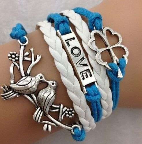INFINITY CHARMS LOVE BIRDS, 4 LEAF CLOVER AND LOVE WORD ON PLATE  LEATHER CHARM BRACELET