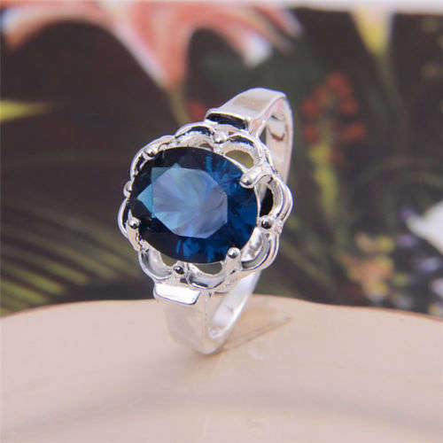 BEAUTIFUL BLUE SAPPHIRE CZ SET IN 925  SILVER PLATED RING SIZE 8 (Q)