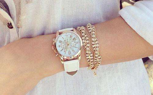 PURE WHITE FACE AND STRAP  GENEVA DIAL YELLOW GOLD CASE WITH ROMAN NUMERALS  LADIES STUNNING WATCH