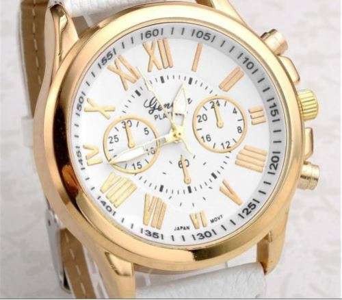 PURE WHITE FACE AND STRAP  GENEVA DIAL YELLOW GOLD CASE WITH ROMAN NUMERALS  LADIES STUNNING WATCH