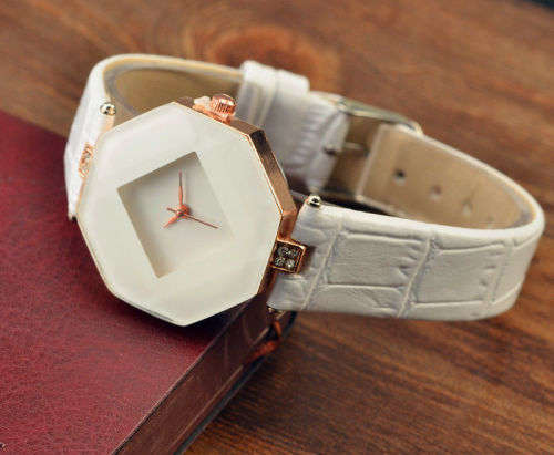 ABSOLUTELY STUNNING WHITE MULTI FACETED HEXAGONAL DIAL WATCH  WITH WHITE FAUX LEATHER STRAP