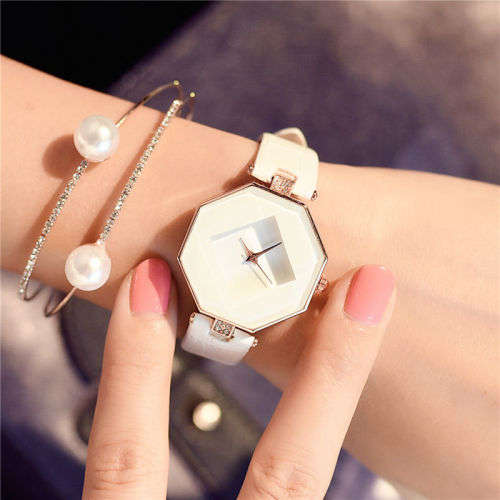 ABSOLUTELY STUNNING WHITE MULTI FACETED HEXAGONAL DIAL WATCH  WITH WHITE FAUX LEATHER STRAP