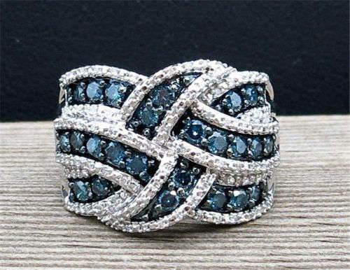 BEAUTIFUL INFINITY RING WITH BLUE SAPPHIRE CZ SET IN 925  SILVER PLATED  SIZE 10 (U 1/2)