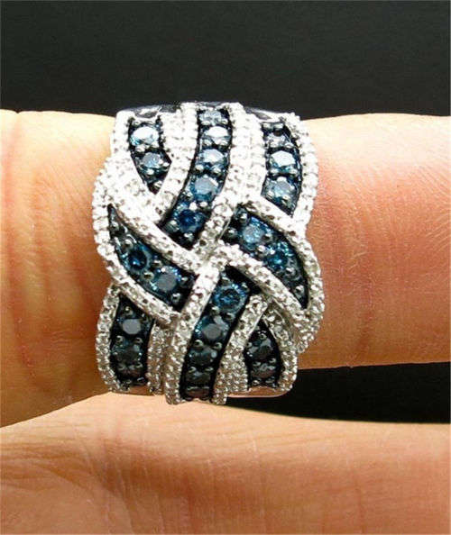 BEAUTIFUL INFINITY RING WITH BLUE SAPPHIRE CZ SET IN 925  SILVER PLATED  SIZE 10 (U 1/2)
