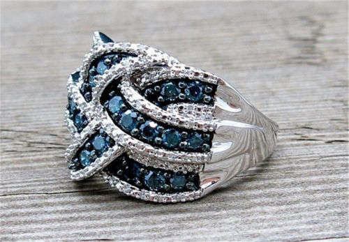 BEAUTIFUL INFINITY RING WITH BLUE SAPPHIRE CZ SET IN 925  SILVER PLATED  SIZE 10 (U 1/2)