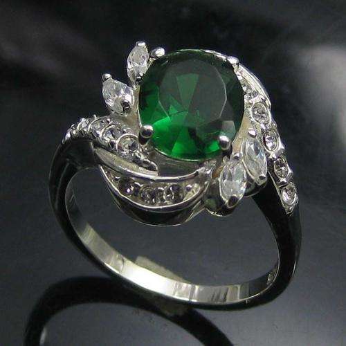 OVAL EMERALD AND DIAMOND RING CRAFTED IN SOLID 925 STERLING SILVER