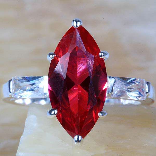 "PRICED TO GO!" MARQUISE RUBY QUARTZ & WHITE TOPAZ CZ RING CRAFTED IN HALLMARKED 925 STERLING SILVER