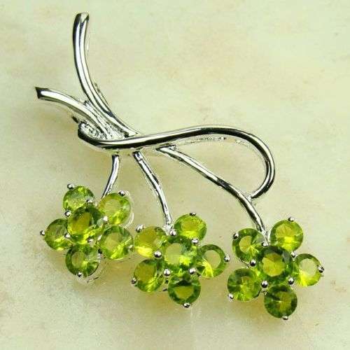 PETITE GREEN PERIDOT FLOWER PENDANT CRAFTED IN SILVER