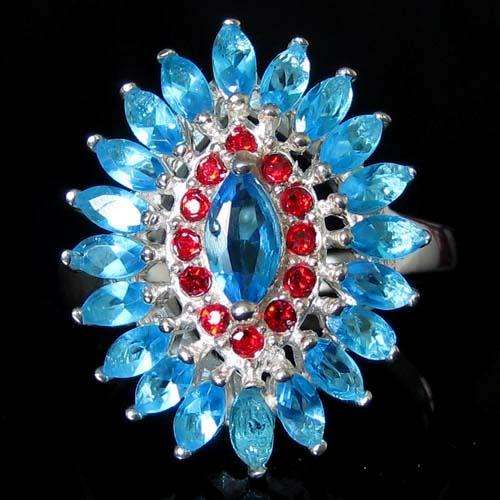 "VERY DIFFERENT" BLUE TOPAZ CZ & SWAROVSKI RING CRAFTED IN HALLMARKED 925 STERLING SILVER