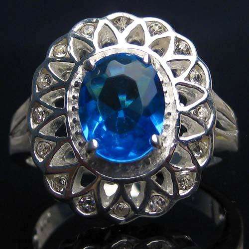 "BEAUTIFUL" BLUE TOPAZ CZ & WHITE TOPAZ CZ  RING CRAFTED IN  . 925 STERLING SILVER