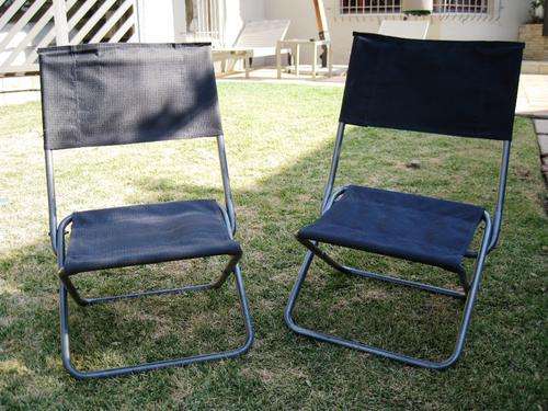 TWO BLACK BEACH CHAIRS
