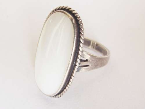 HUGE MOTHER OF PEARL SET IN A STERLING SILVER RING