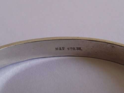 LOVELY VINTAGE PATTERNED STERLING SILVER CLIP BANGLE WITH SAFETY CHAIN, MAKERS MARK "H & S"