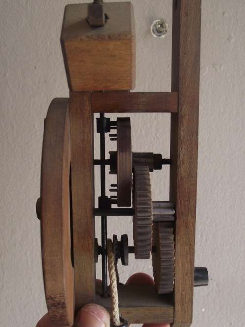 AN INCREDIBLE VINTAGE SWISS MADE "BAUMANN A.G. BUCO 1301" WOODEN GEAR WEIGHT DRIVEN WALL CLOCK
