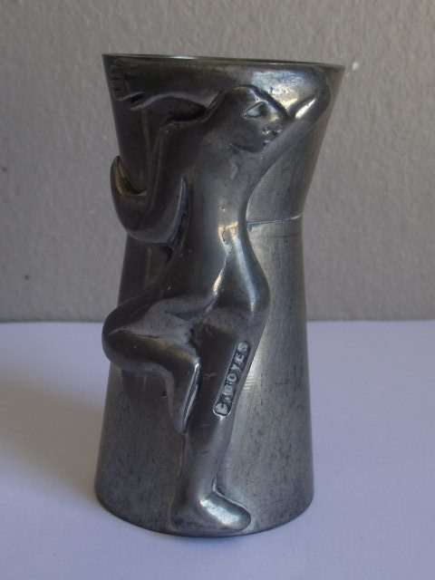 CARROL BOYES MAN DESIGN PEWTER AND ALUMINIUM TOT MEASURE