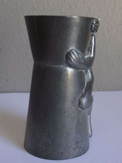 CARROL BOYES MAN DESIGN PEWTER AND ALUMINIUM TOT MEASURE