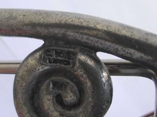 LOVELY CARROL BOYES PEWTER AND STAINLESS SERVIETTE HOLDER, COIL DESIGN