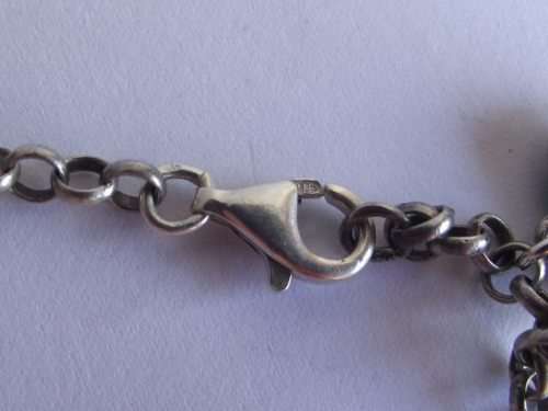 BEAUTIFUL STERLING SILVER CHARM BRACELET WITH 10 ASSORTED CHARMS ATTACHED
