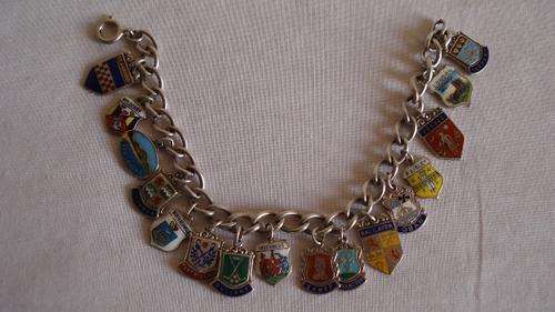 LOVELY STERLING SILVER CHARM BRACELET WITH 16 COAT OF ARMS ATTACHED