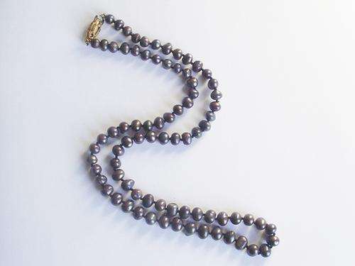 STUNNING PEARL NECKLACE WITH A BEAUTIFUL STERLING SILVER CLASP