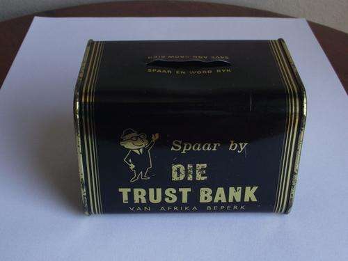 OLD "THE TRUST BANK" MONEY BOX/ SAVINGS BANK TIN